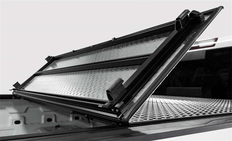 Access LOMAX Folding Hard Cover 19+ Chevy/GMC Full Size 1500 5ft 8in (w/ CarbonPro) Black Urethane B3020109