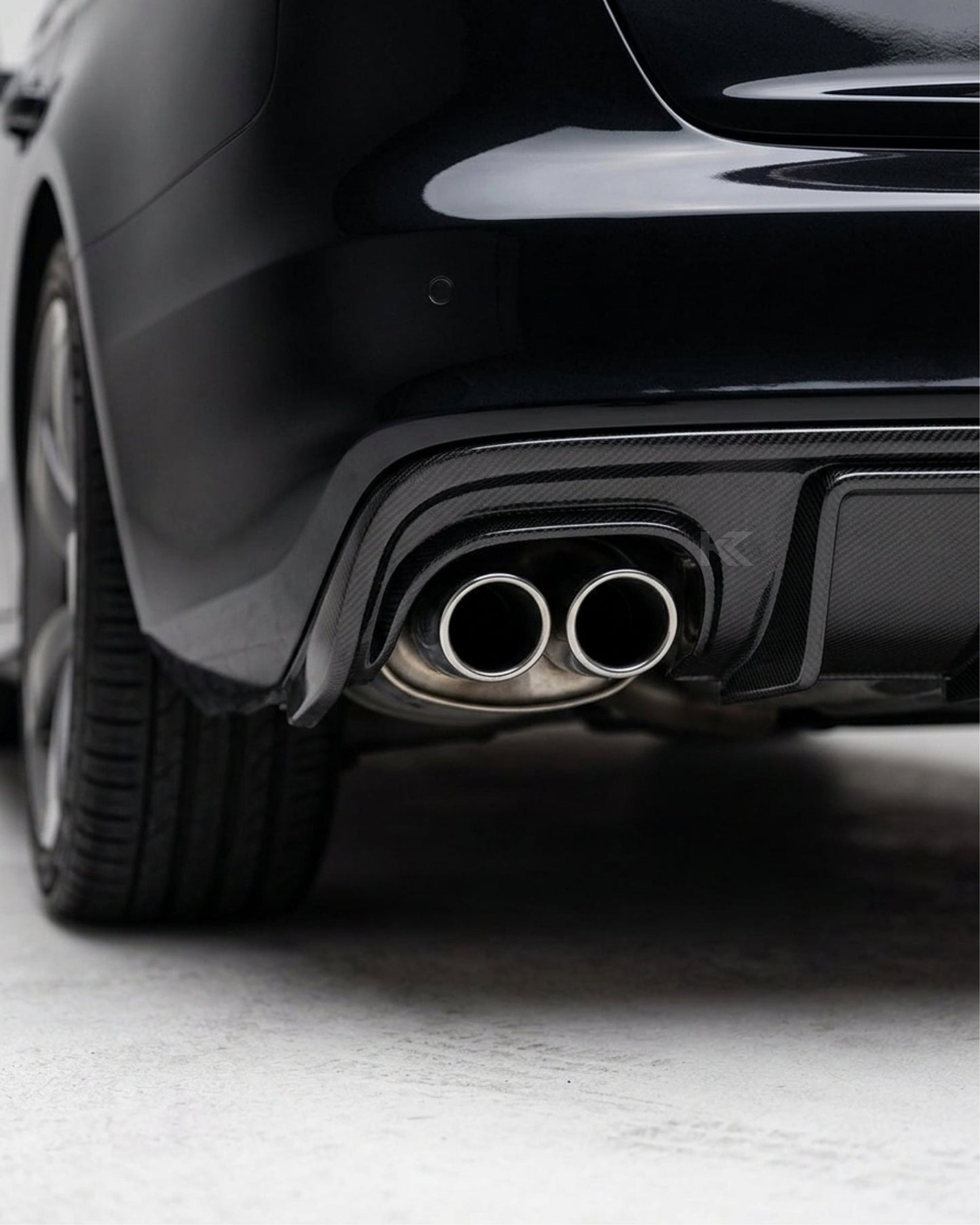 2008–2012 Audi A4 S-Line / S4 B8 Sedan Rear Bumper Lip with Integrated Brake Light – Carbon Fiber