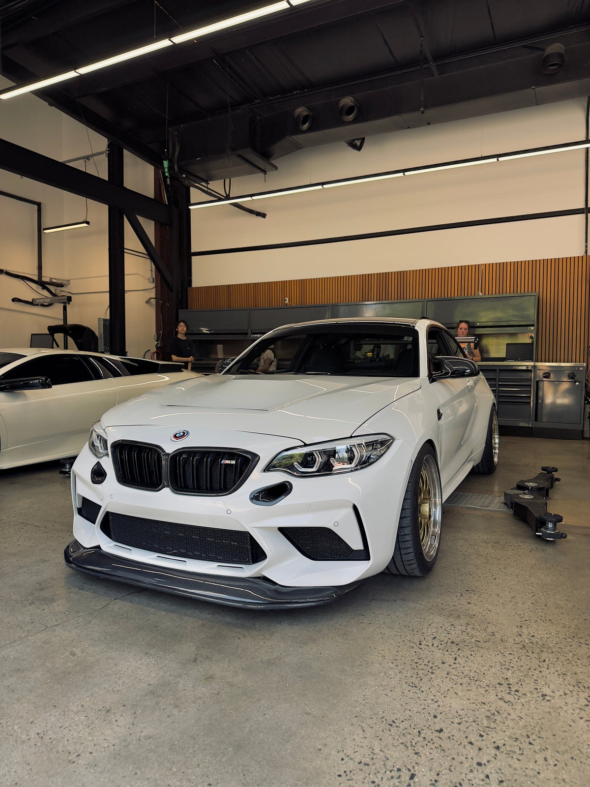 Ridgeline Motorsport chassis-mounted GTS splitter on a BMW F87 M2